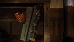 Close-up of bookshelf with butterfly in Bad Mojo